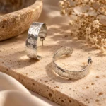 Wide Hammered Semi Hoop Earrings - Image 4