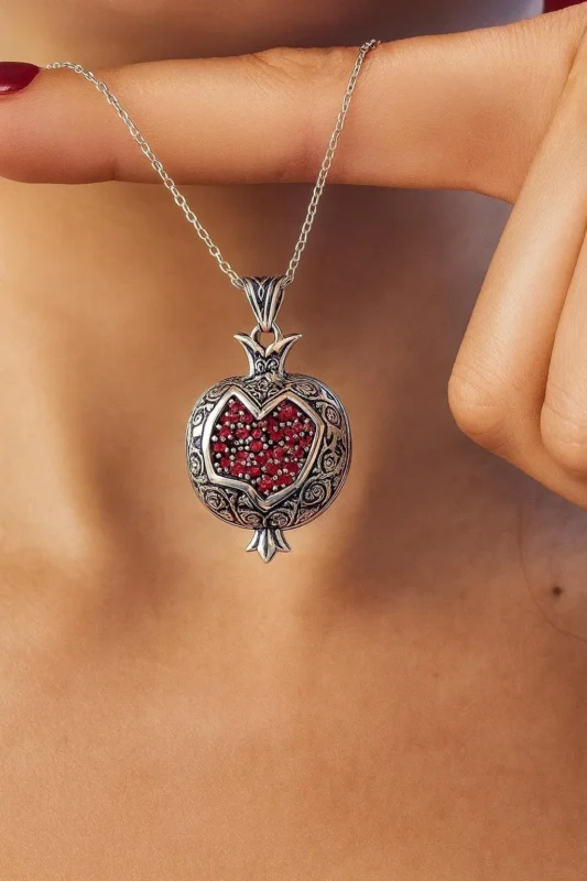 Contemporary pomegranate jewellery inspired by Persian Yalda traditions